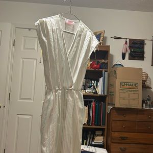 Blue, pink, and purple striped jumpsuit with belt loops